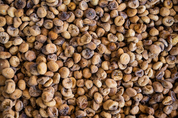 Top view of the shelf with dried figs in the bazaar.
