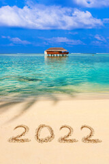 Fototapeta premium Numbers 2022 on beach