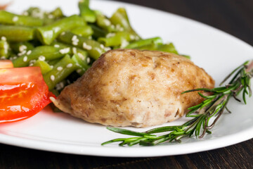 baked asparagus beans with sesame seeds and meat cutlet