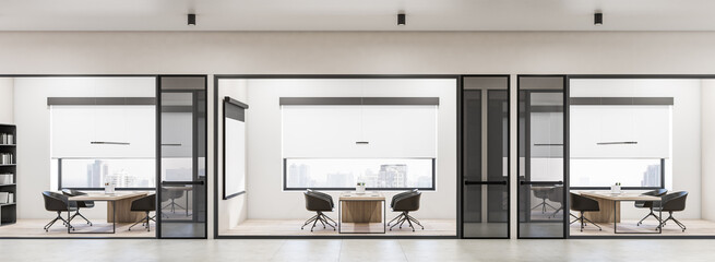 Fototapeta premium Modern panoramic concrete office interior with glass partition and furniture, daylight, window with city view. Workplace concept. 3D Rendering.
