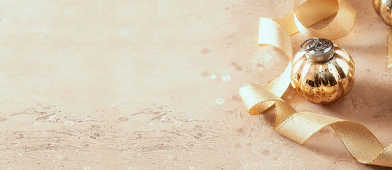 Sparkling  Christmas ball  and golden ribbon on large background for web banner.Merry Christmas and happy New year.