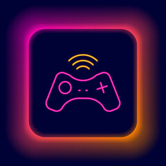 Glowing neon line Wireless gamepad icon isolated on black background. Game controller. Colorful outline concept. Vector