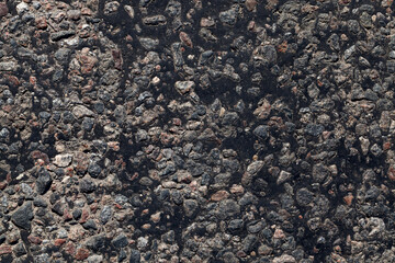 paved road, a close-up of a part of the carriageway of an asphalt road