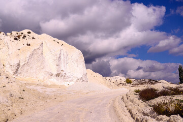 White chalk mountain, quarry against the blue sky