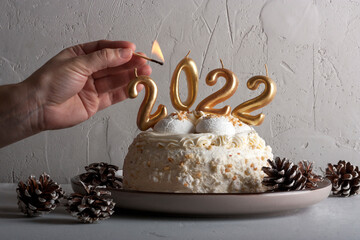 New Year's cake with candles 2022
