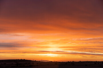 Obraz premium Atardecer y Molinos