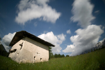 Sunny day on dolomites,  long exposure with moving clouds