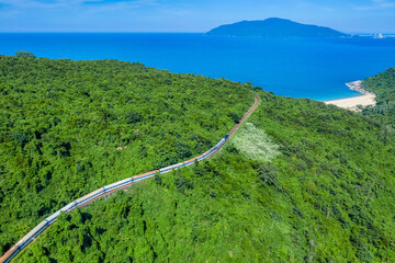 Aerial view of train and railway on Hai Van pass, Da Nang area, Vietnam