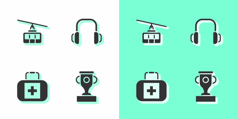 Set Award cup, Cable car, First aid kit and Winter headphones icon. Vector
