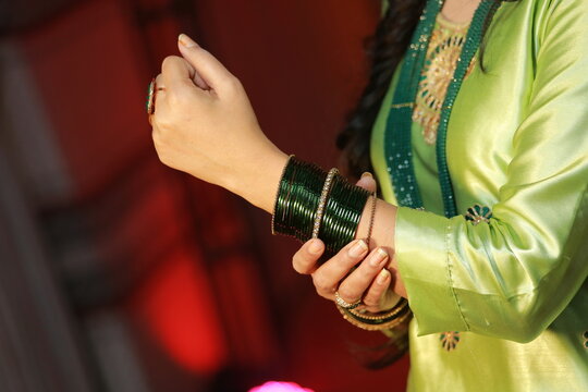 Mehndi Bride showing green bangles