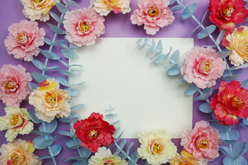 Obraz na płótnie Canvas Mockup with Spring Flowers and invitation greeting card