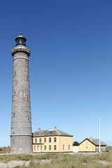 Fototapeta na wymiar The grey lighthouse in Skagen, Denmark