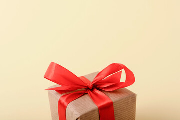 Nice little gift box with red bow. Vintage retro present with copy space.