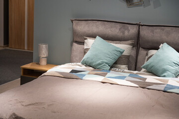 Fototapeta na wymiar beautiful bedroom interior with linens