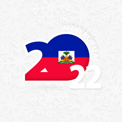Happy New Year 2022 for Haiti on snowflake background.