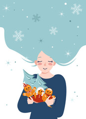 Young woman with blue hair hugs decorations for New Year and Christmas of gingerbread men and tree. Happy girl is waiting for winter. Holiday postcard