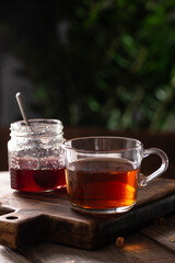 Cup of hot tea with jam