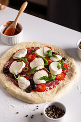 Woman making pizza, step by step instructions