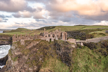Fototapeta na wymiar Dramatic sky above Dunluce Castle, County Antrim, Northern Ireland.
