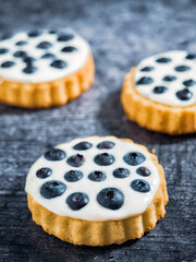 Tartlets with custard and blueberries. 