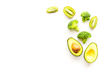 Layout of raw green vegetables and herbs protein food