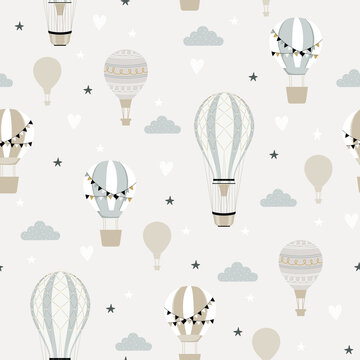 Blue hot air ballon and clouds seamless childish pattern. Hand drawn repeat pattern for wrapping, fabrik, textile or paper projects. Vector illustration.