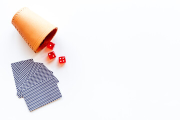 Poker dices and playing cards top view. Casino games concept