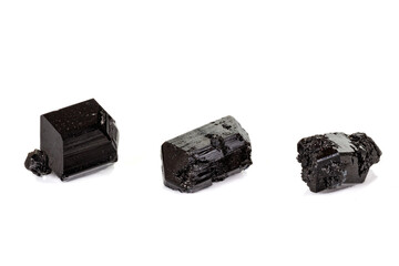 macro mineral stone schorl, black tourmaline on white background
