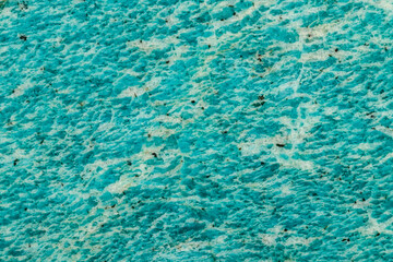 Macro of mineral stone amazonite on a black background