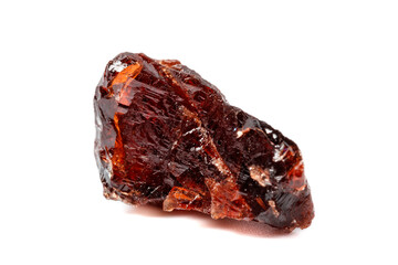 Macro mineral stone Garnet Spessartine on a white background