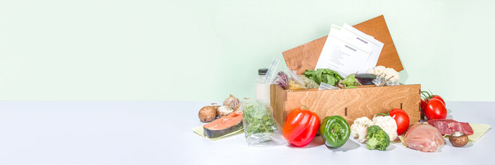 Meal Kit Delivery Concept. Set various healthy dishes food ingredients meat, vegetables, fruit,...