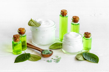 Cosmetic products with tea aroma oil and green leaves