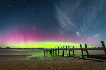 Aurora Australis Southern Lights with Jetty At Night  - obrazy, fototapety, plakaty