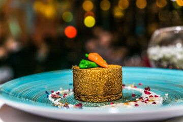 Delicious chocolate sweet dessert on a blue plate. Close up