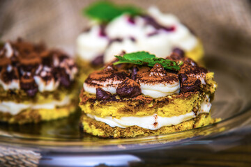Delicious chocolate sweet dessert with nuts and mint.  Close up