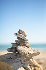 Pyramid of stones on the coast. Eternity. Zen. Meditation. The journey of the soul.
