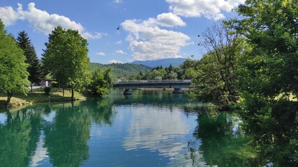 Fototapeta premium Beautiful river Una in the center of Bihać, Bosnia and Herzegovina. Reflection in the river Una.