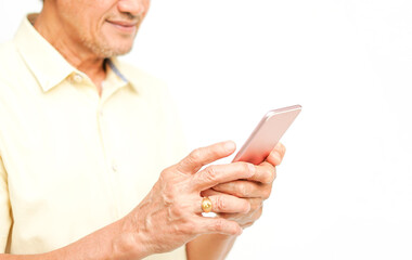 old man hands using technology smartphone isolated on white background with copy space, selective focus