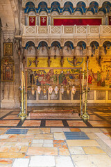 The Stone of the Anointing in the Church of the Holy Sepulchre in Jerusalem, Israel - obrazy, fototapety, plakaty