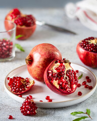 Juicy pomegranates on a ceramic plate
