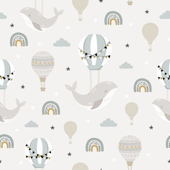 Sleeping whales, hot air ballon and rainbow seamless childish pattern. Hand drawn repeat pattern for wrapping, fabrik, paper or textile projects. Vector illustration.