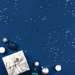 Christmas background of gift box and decorations.