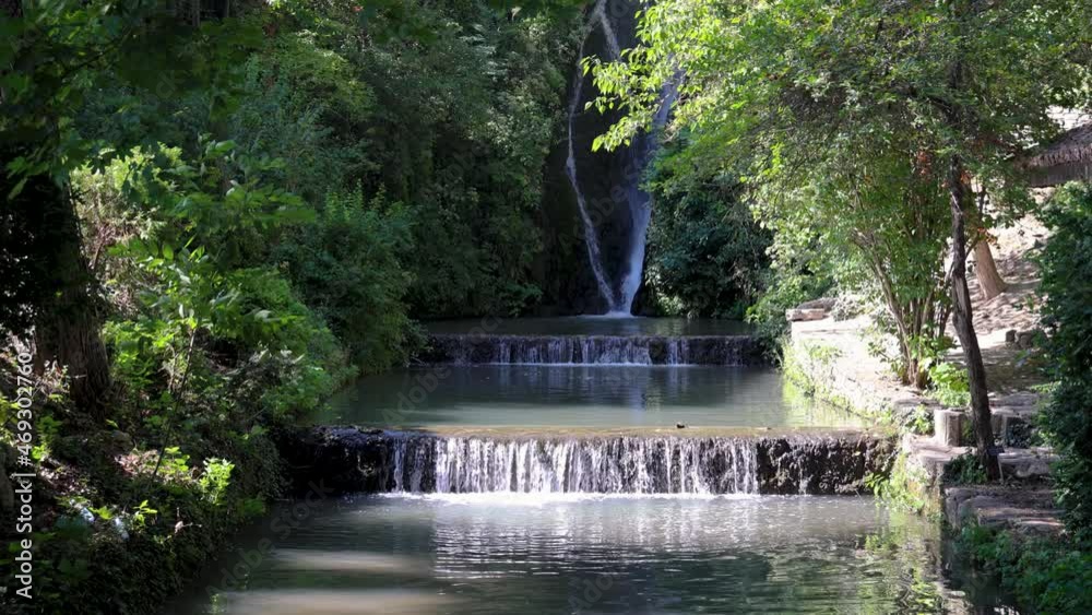 Sticker Waterfall in Palace architectural park and botanical garden complex Balchik town, Bulgaria, 4k