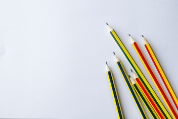 back to school concept, pencil on white paper background