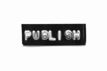 Black color banner that have embossed letter with word publish on white paper background