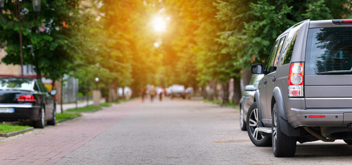 Close up of a car parked illegally against traffic rules on pedestrian city street side