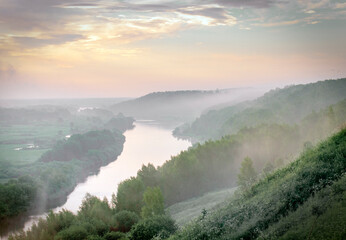 early morning view of the river from the high bank