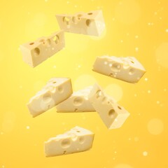 Falling fresh tasty yellow cheese on a background
