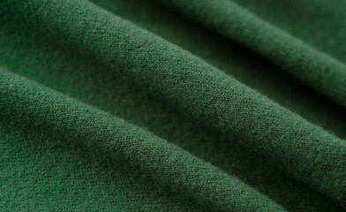 Fototapeta premium Green woolen natural texture, knitted textile background