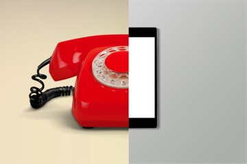 Old vs new technology. Retro phone and modern smartphone